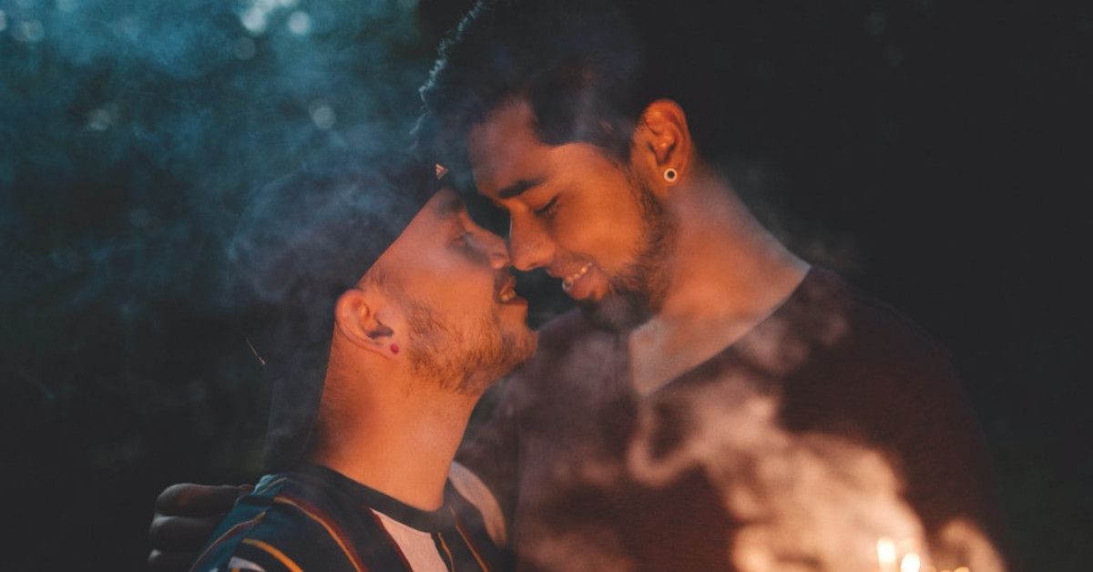 Couple sharing a sweet moment with a memorable first kiss.