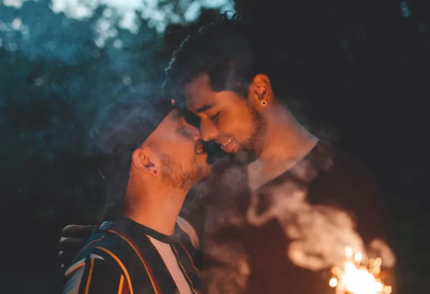 Couple sharing a sweet moment with a memorable first kiss.